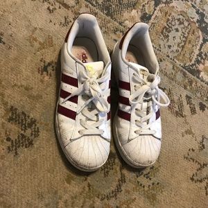 adidas superstars with maroon stripes